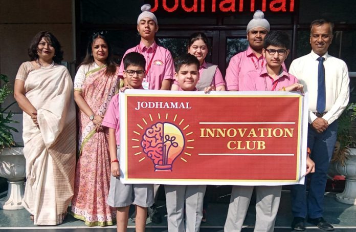 Students of Jodhamal posing along with staff members.