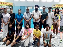 Selected swimmers posing with JKSA president Ramandeep Singh Soodan and other office bearers.