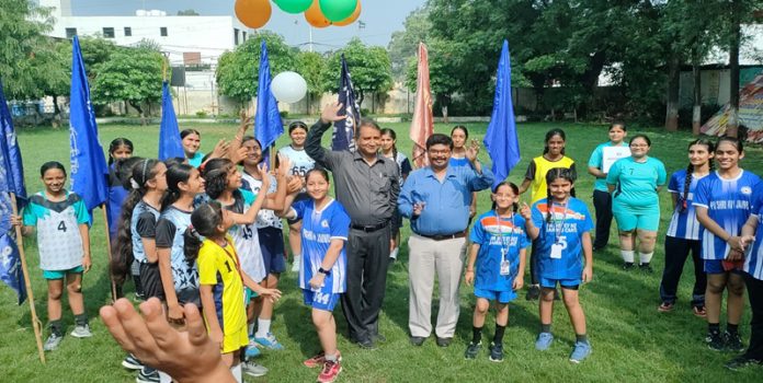 Dignitaries posing along with young girls during KVS Regional Sports Meet inaugural event at Jammu.