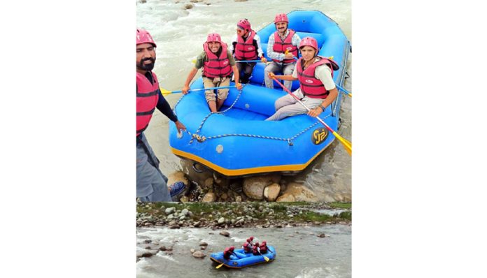 Rafters enjoying rafting in Poonch on Wednesday.