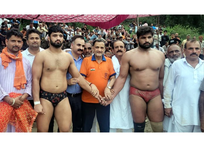 Wrestlers being introduced before the main bout at Reasi on Wednesday.