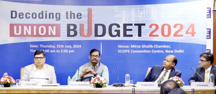 Dignitaries participating in a session on Union Budget in Jammu on Monday.