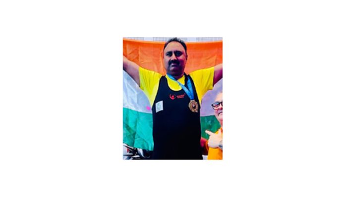 Haripal Singh Jasrotia posing during World Cup Powerlifting International event at England.