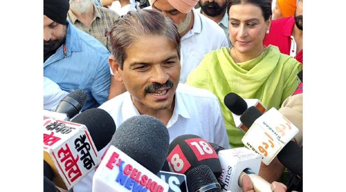 DGP, RR Swain speaking to media on the sidelines of First Kashmir Hockey League inaugural match at Polo Ground Srinagar on Wednesday.-Excelsior/Shakeel