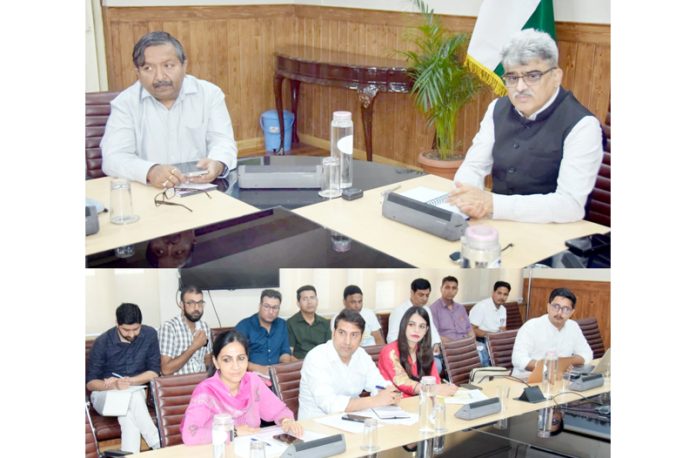 Chief Secretary Atal Dulloo chairing a meeting on Friday.