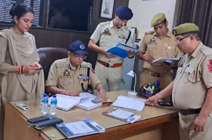 DIG JSK Range, Dr Sunil Gupta inspecting records at Police Station Trikuta Nagar, Jammu on Wednesday.