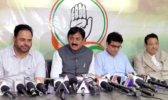 Bharatsinh Solanki, in-charge of Jammu and Kashmir Congress affairs, during a press conference in Srinagar on Monday. — Excelsior/Shakeel
