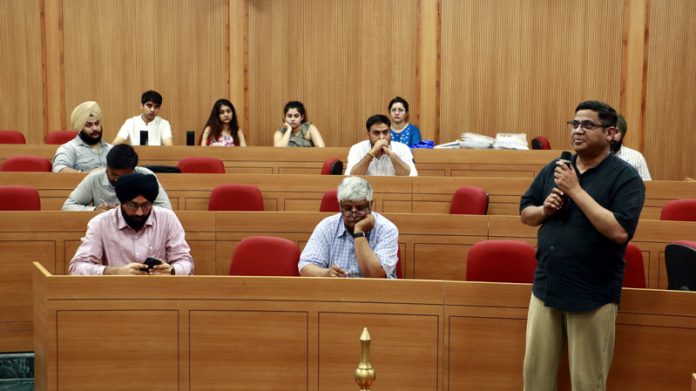 A participant addresses during a Capacity Building Programme at IIM Jammu on Monday.