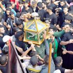 Shia Muslims during Muharram procession in Srinagar on Monday. — Excelsior/Shakeel