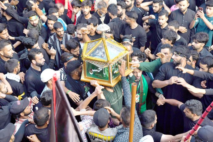 Shia Muslims during Muharram procession in Srinagar on Monday. — Excelsior/Shakeel