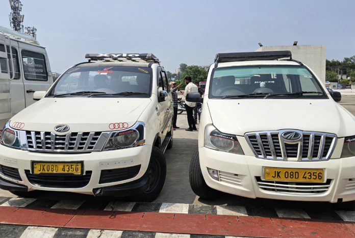 Identical vehicles with same registration number in the custody of police. —Excelsior Rakesh