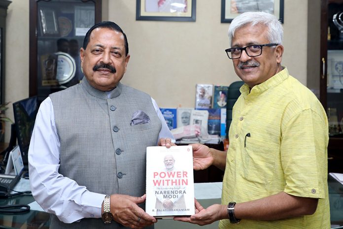 Noted intellectual Dr R Balasubramaniam, Member-HR Capacity Building Commission, presenting his latest book to Union Minister Dr Jitendra Singh at New Delhi on Sunday.