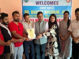 DSW Jammu, Dr Bharat Bhushan, honouring an NGO working against drug abuse in Kathua on Wednesday.