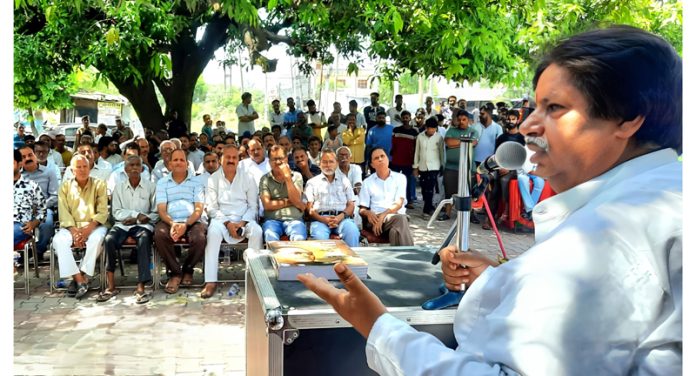 Congress leader, Raman Bhalla addressing a gathering at Jallochak in Jammu on Sunday.