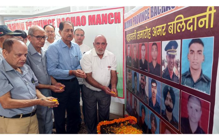 Members of Jammu Province Bachao Manch paying tribute to martyrs during a function on Tuesday.