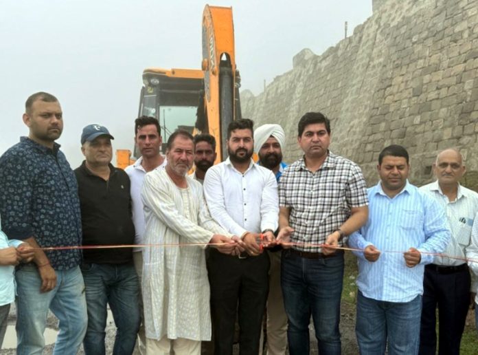 DDC Member, Jagbir Das inaugurating construction work of Patnitop-Sanasar road in Ramban on Thursday.