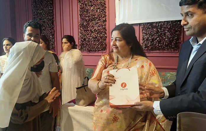 Padma Shree singer Anuradha Paudwal during the distribution of free hearing aids among needy children in Srinagar on Friday. -Excelsior/Shakeel