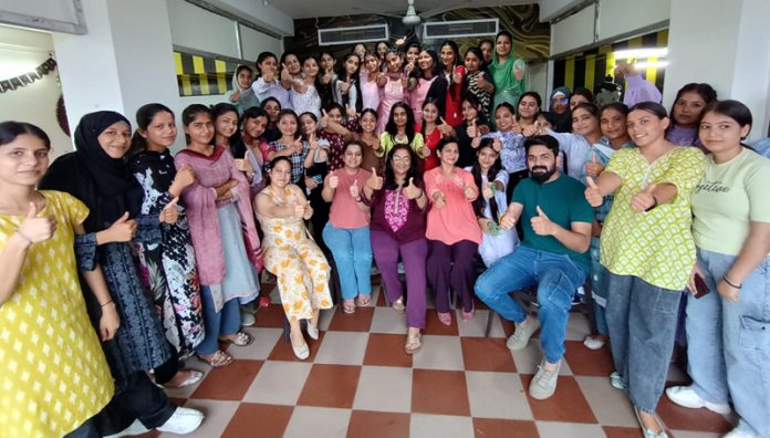 Participants at the 20 days workshop pose for a group photograph with others at NIFD Jammu on Wednesday.
