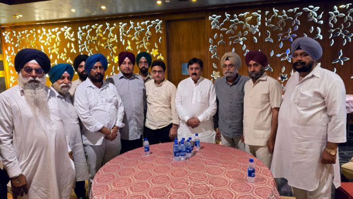 Sikh delegation led by DDC Member T S Tony during meeting with AICC leader Bharatsinh Solanki in Jammu.