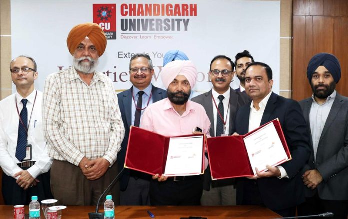 Chandigarh University Pro Vice Chancellor Prof (Dr) Devinder Singh, faculty and students posing for a group photograph during a function organised at CU on Tuesday.