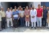BJP leader, Sanjay Baru posing with the residents of Shanker Vihar Talab Tilloo after listening public grievances on Sunday.