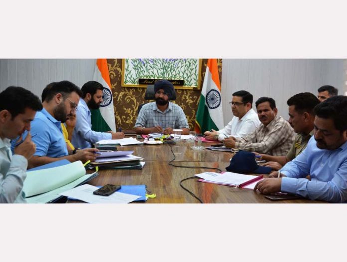 DC Doda Harvinder Singh chairing a meeting.