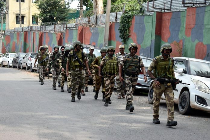 Security forces taking out Area Domination Route March in Rajouri on Tuesday.