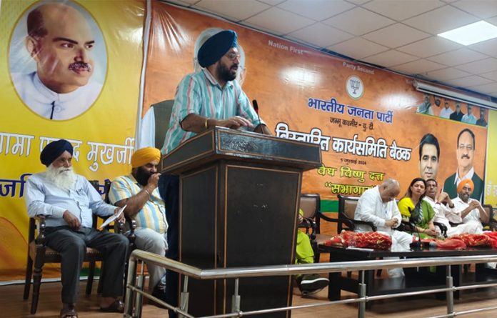 BJP Minority Morcha president Ranjodh Singh Nalwa addressing party workers during a meeting at party headquarters in Jammu.