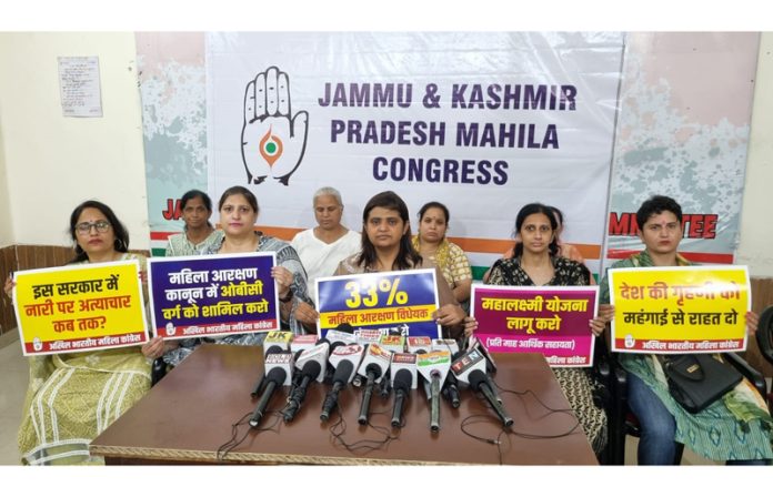 J&K Mahila Cong vice president flanked by others addressing press conference in Jammu on Saturday. - Excelsior/Rakesh