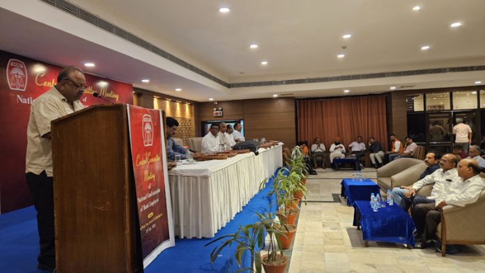 SBI officials interacting with the staff federation leaders during a function on Monday.