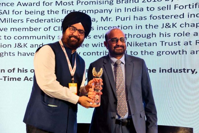 Sanjay Puri, Managing Director of P Mark receiving award on Monday.