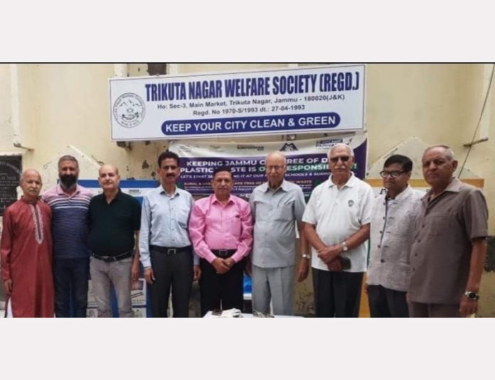 Members of Trikuta Nagar Welfare Society posing for a group photograph after a meeting at Jammu on Monday.
