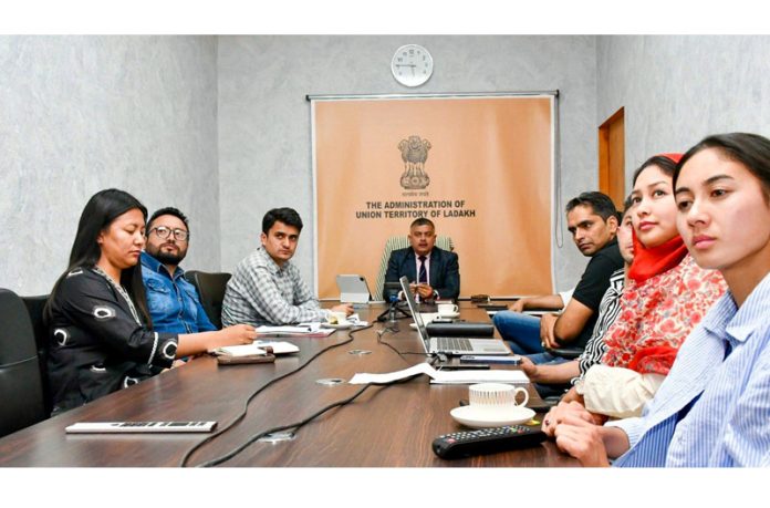 Transport Secretary Ladakh, Amit Sharma chairing a meeting in Leh on Tuesday.