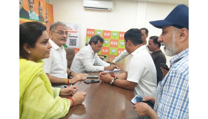 BJP leaders listening public grievances at Jammu on Tuesday.
