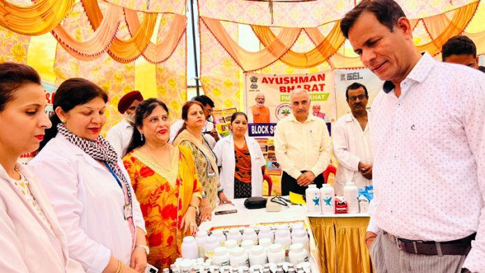 Principal Secretary PDD H Rajesh Prasad inspecting a stall during Public Darbar.