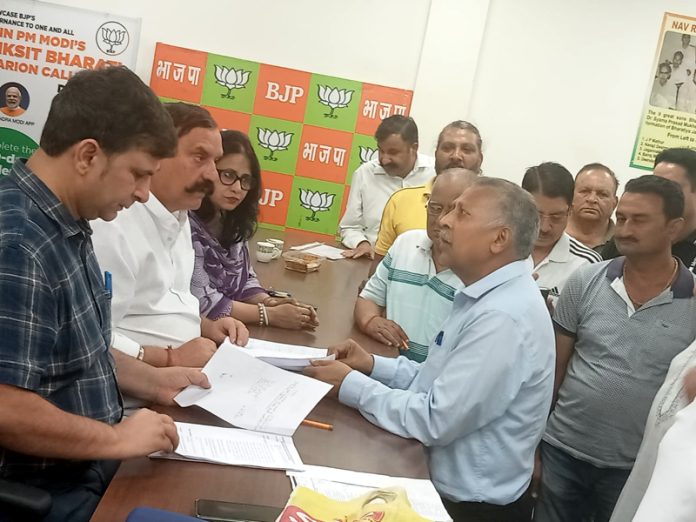 BJP leaders listening public grievances at party office Jammu on Thursday.