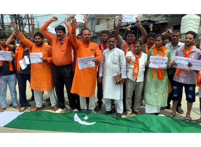 Shiv Sena leaders raising slogans during a protest at Jammu on Thursday.