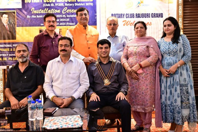 Newly inducted Rotary Club Rajouri president, secy and other members.