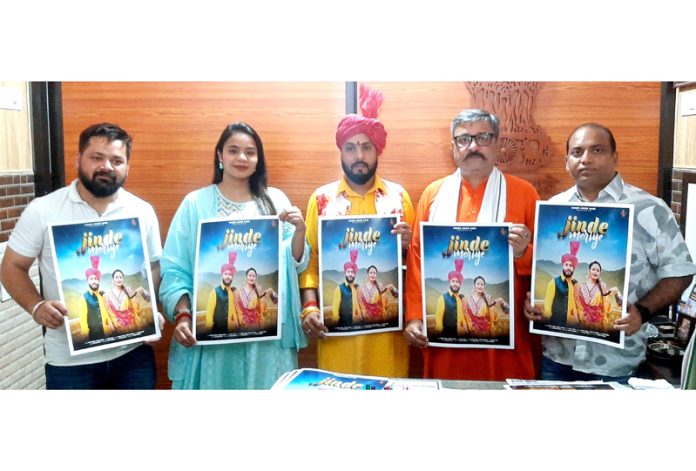 BJP leader, Zorawar Singh Jamwal along with others releasing album of song 'Jinde Meriye' at Jammu on Thursday.