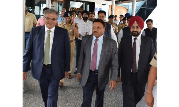 An ECI delegation led by CEC Rajiv Kumar and ECs Gyanesh Kumar and Dr S S Sandhu arrives to review poll preparedness in Srinagar on Thursday.