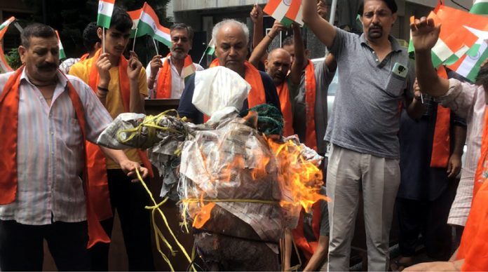 Activists of Dogra Front and Shiv Sena staging a protest in Jammu on Wednesday.