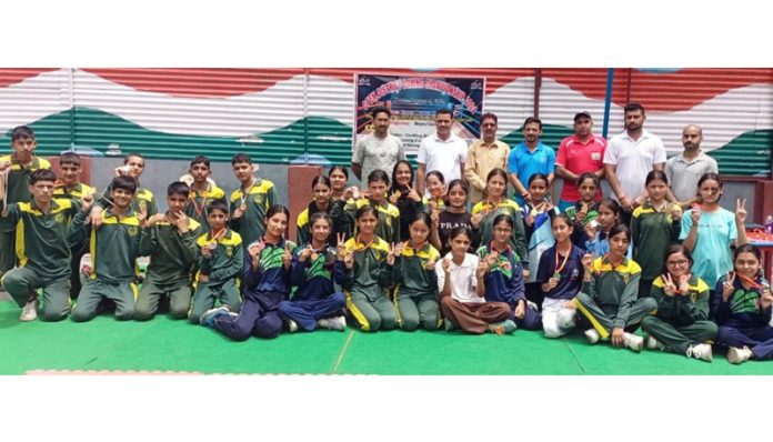 Young boxers posing for photograph at Doda.