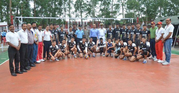 Administrative Secretary Bhupinder Kumar posing along with players at Sainik School Nagrota.