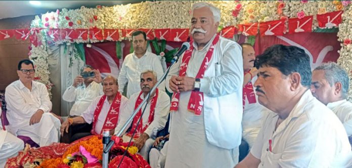 NC leader Ajay Sadhotra addressing a election meeting in Jammu North on Friday.