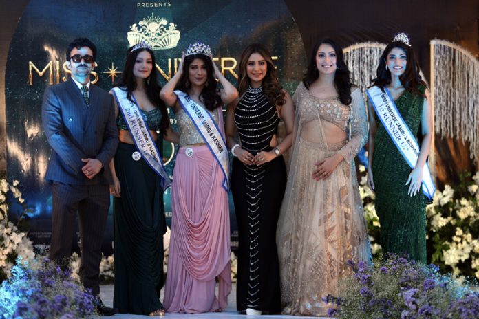 Priyanka Pandita, winner of Miss Universe J&K posing along with others during an event held in Jammu on Saturday.