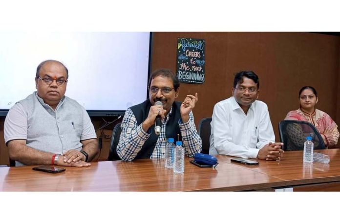 Former DG IIMC iinteracting with students at IIMC Jammu on Saturday.