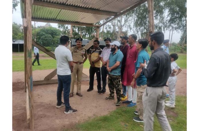 DIG Traffic Jammu Dr M Haseeb Mughal interacting with organizers of Shri Baba Budha Amarnath Yatra at Rajouri base camp. DIG Traffic Jammu Dr M Haseeb Mughal interacting with organizers of Shri Baba Budha Amarnath Yatra at Rajouri base camp.