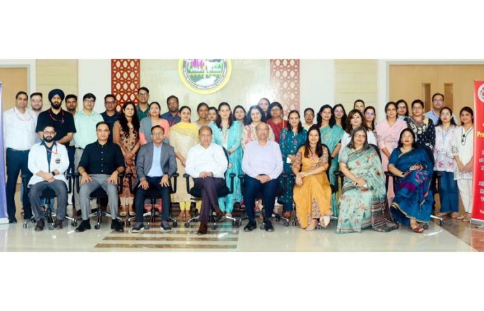 ED & CEO of AIIMS Jammu, Dr Shakti Kumar Gupta and Hemovigilance experts posing with participants of a CME program.