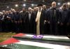 Iran's supreme leader prays over the coffin of Hamas leader Haniyeh, whose killing risks a wider war