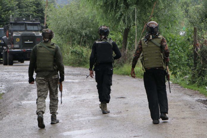 Troops being inducted to track down the militants in Ahlan Gagarmandu in J&K Anantnag district on Sunday